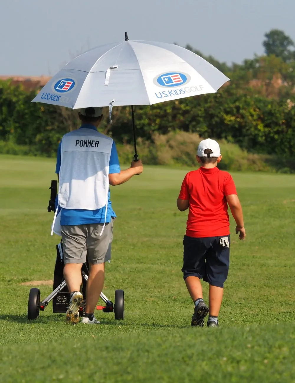 Timo Pommer als Caddy seines Sohnes bei der US Kids Golf World Championship